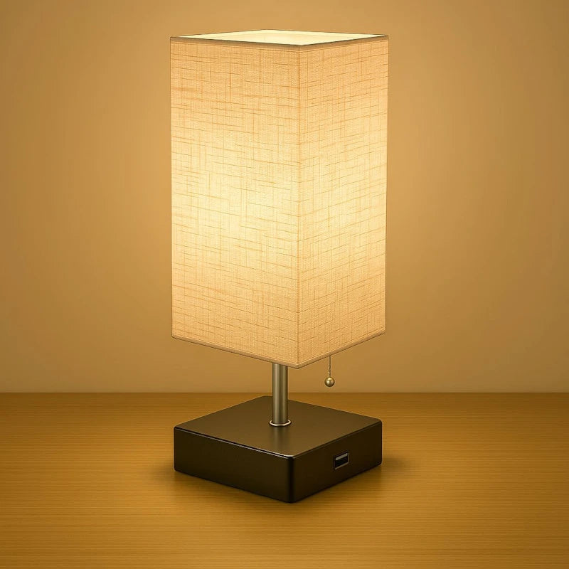 Lampe de chevet avec port USB et tirette sur une table
